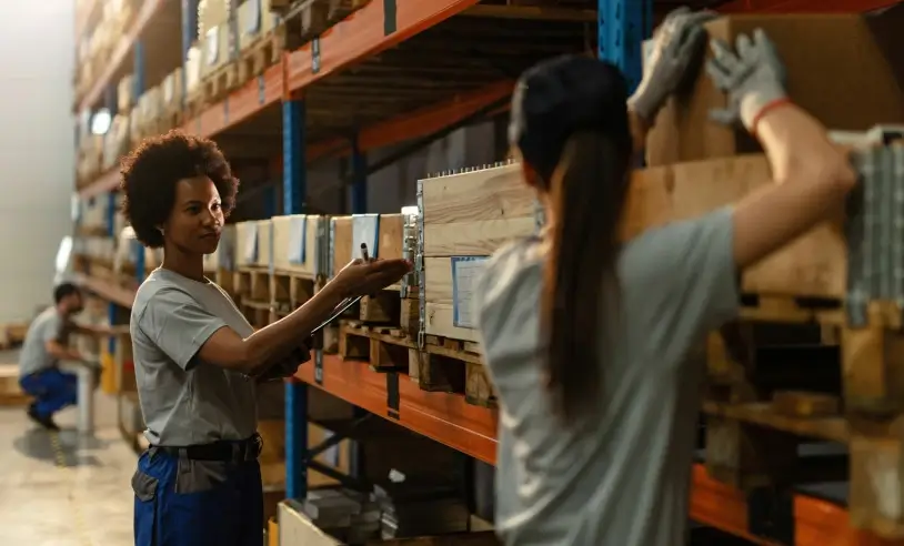 african-american-worker-communicating-with-her-female-colleague-while-preparing-shipment-industrial-warehouse-1-scaled_p30225_cover_image_resized